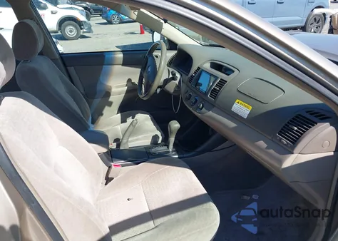 2002 Toyota Camry Le from USA, damaged, VIN JTDBE32K720052674